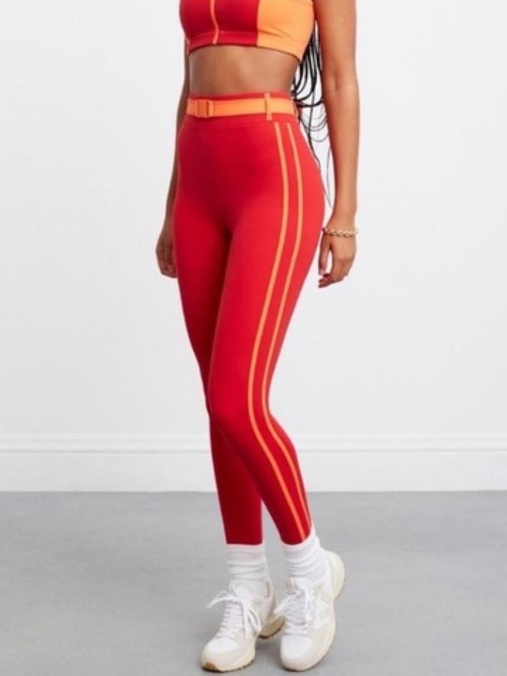 Bandier Solid & Striped Trek Belt Leggings Red and Orange